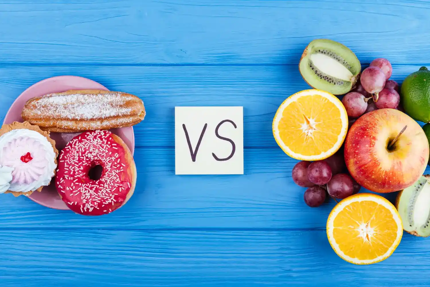 A plate of processed donuts and pastries vs. a selection of fresh, whole fruits